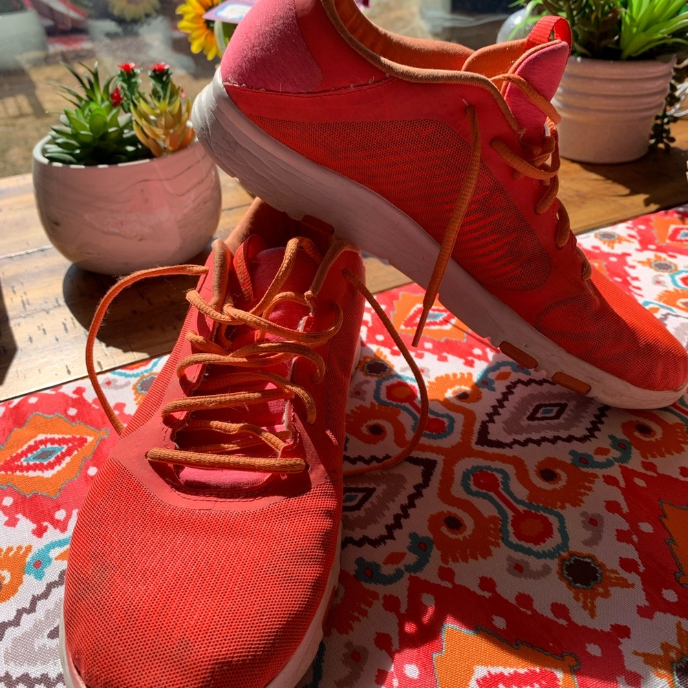 ASICS athletic shoes Orange mesh w/ unique black pattern underneath. See photos